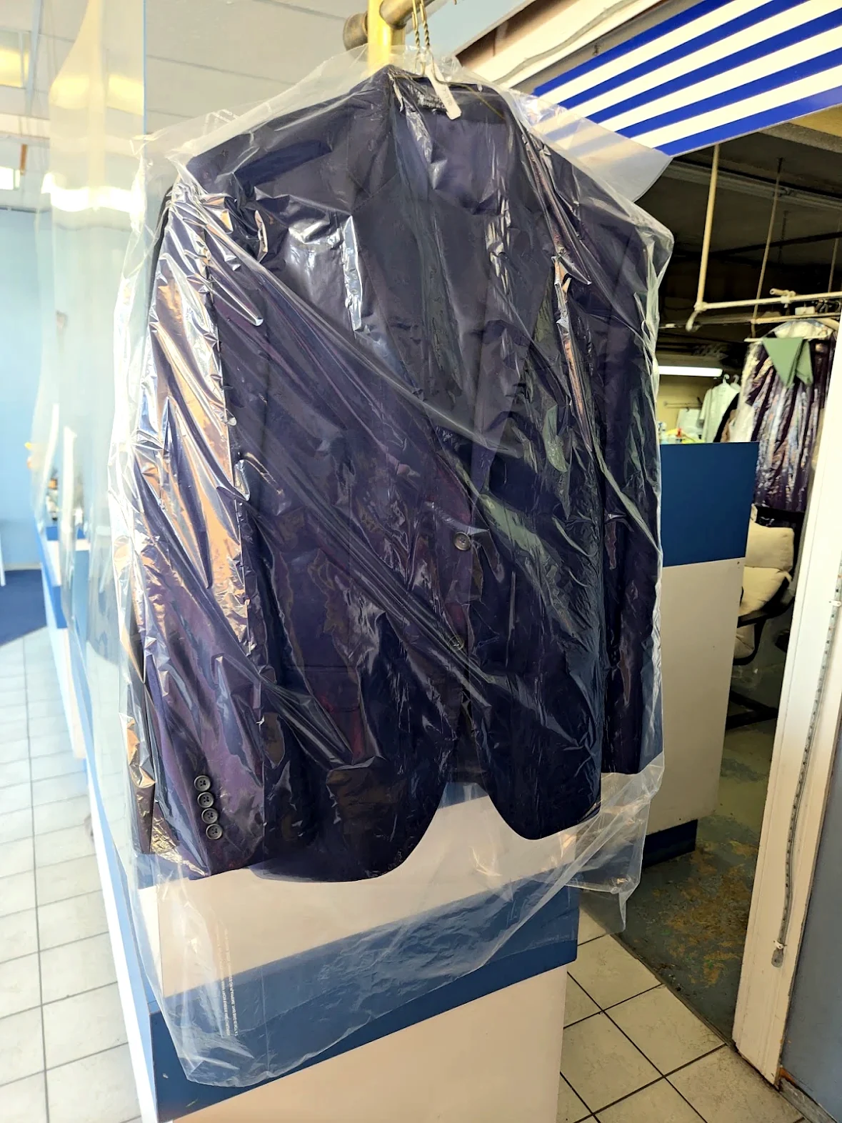 Suit jacket professionally cleaned and prepared at Royal Oak Drycleaners