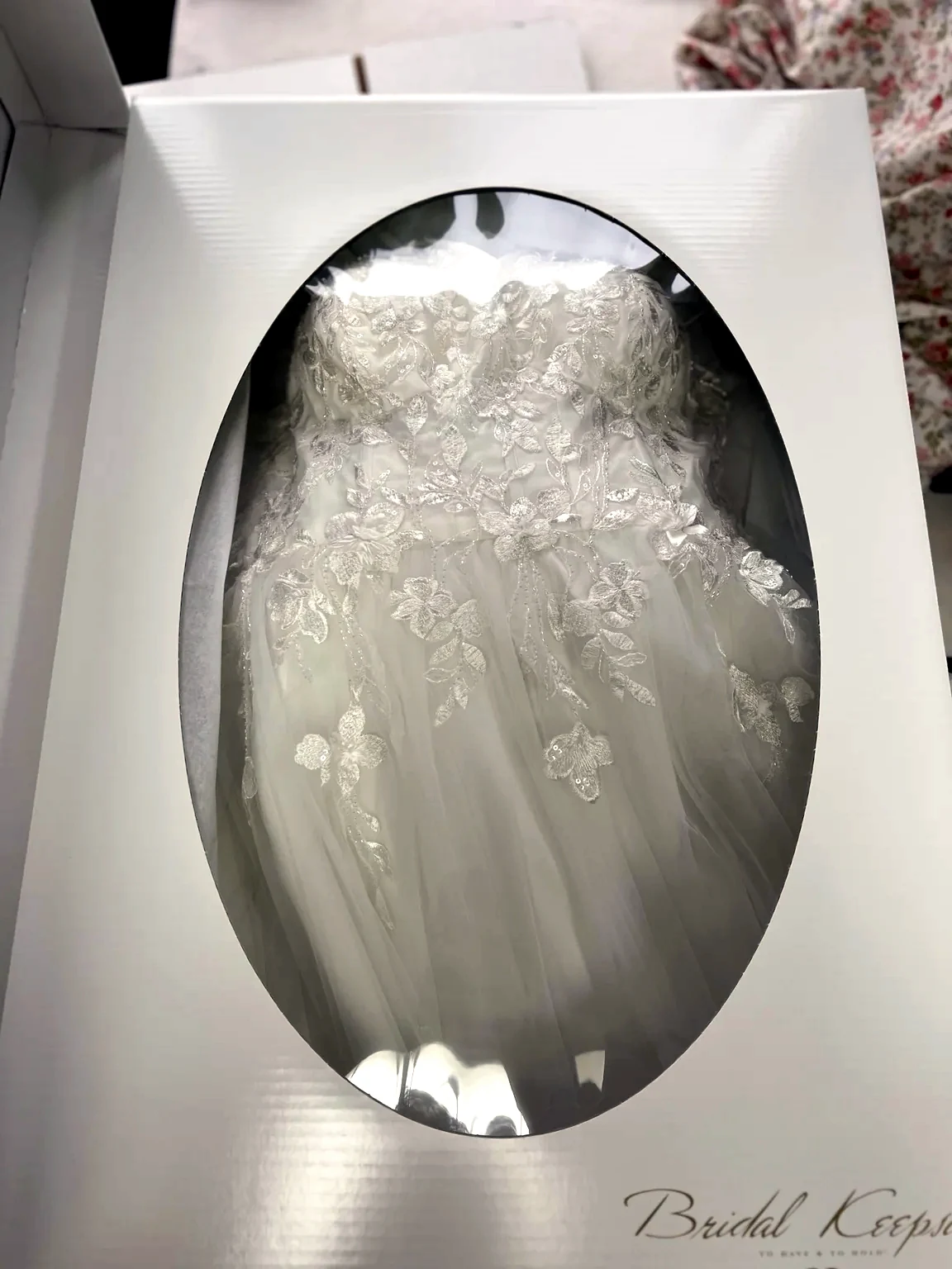 Real wedding gown preserved in a bridal preservation box at Royal Oak Drycleaners